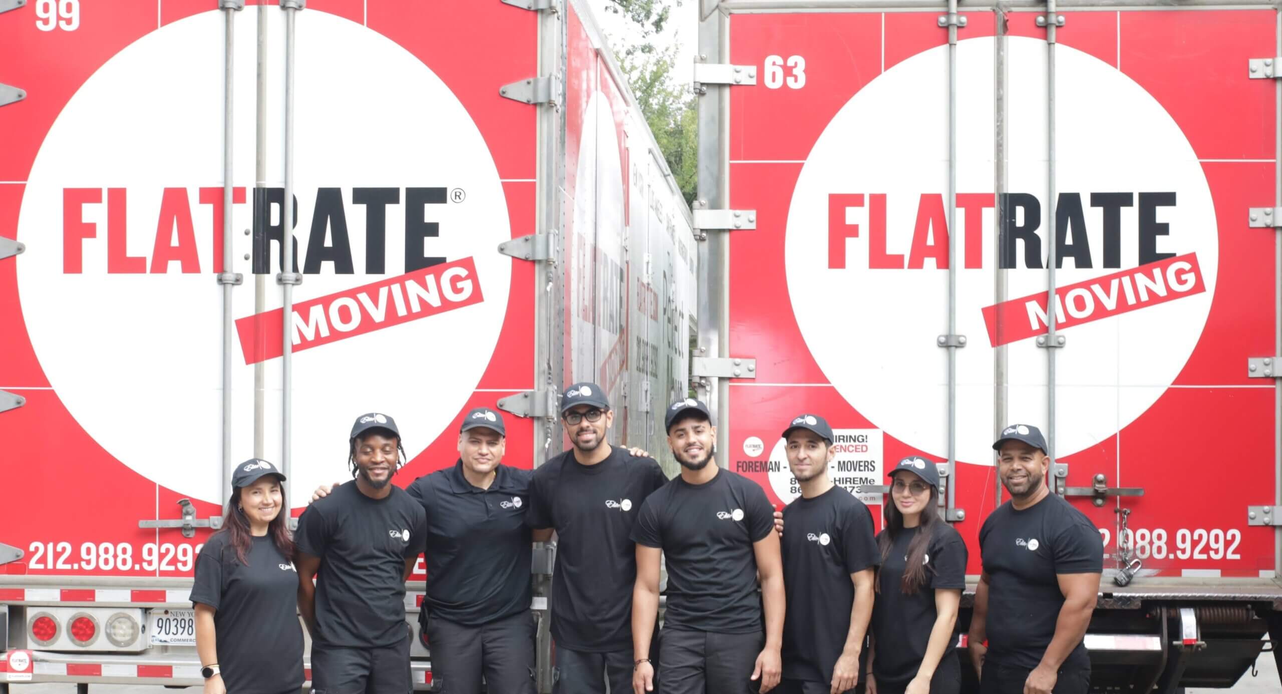 Navigating the Challenges of Moving: Protecting Yourself Against Scams FlatRate Movers in front of a moving truck scaled Navigating the Challenges of Moving: Protecting Yourself Against Scams